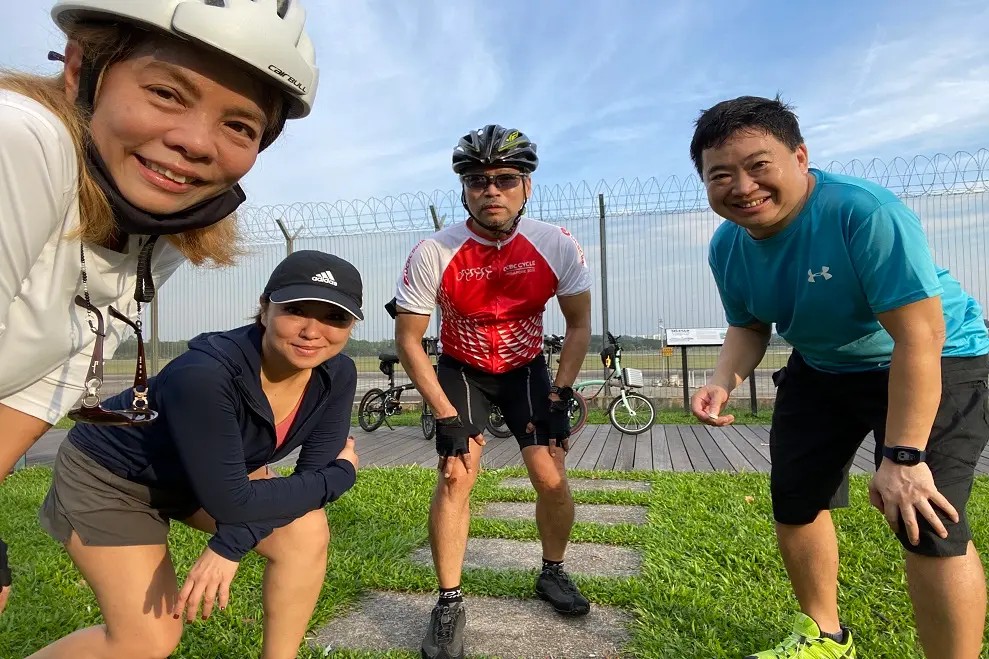 KBR colleagues cycling together in Singapore