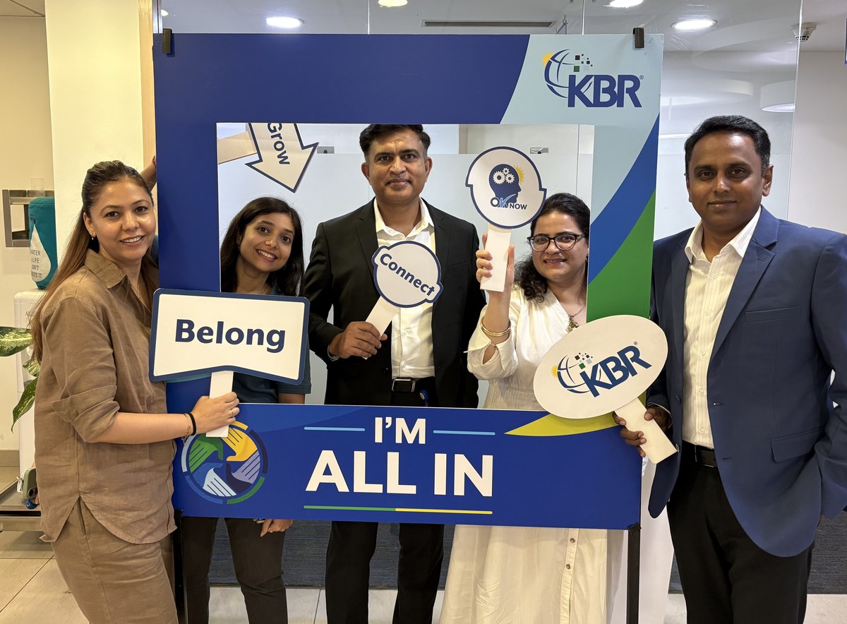 KBR India colleagues posing together at an 'I'm All In' employee engagement event