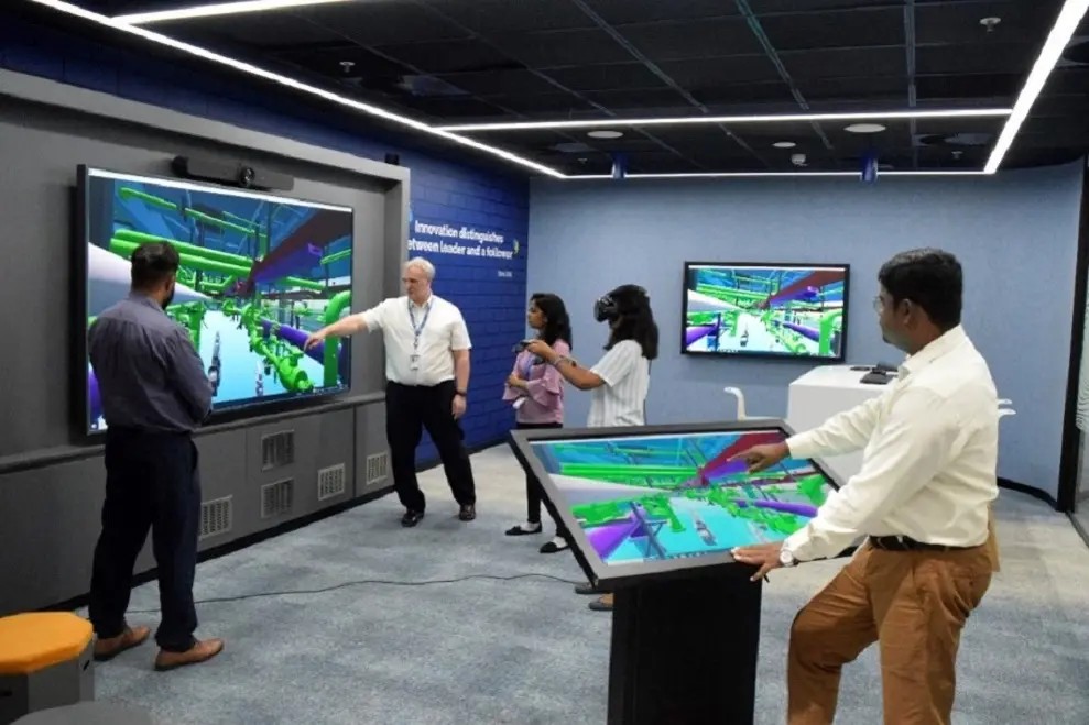KBR team demonstrating technology at an India technology centre