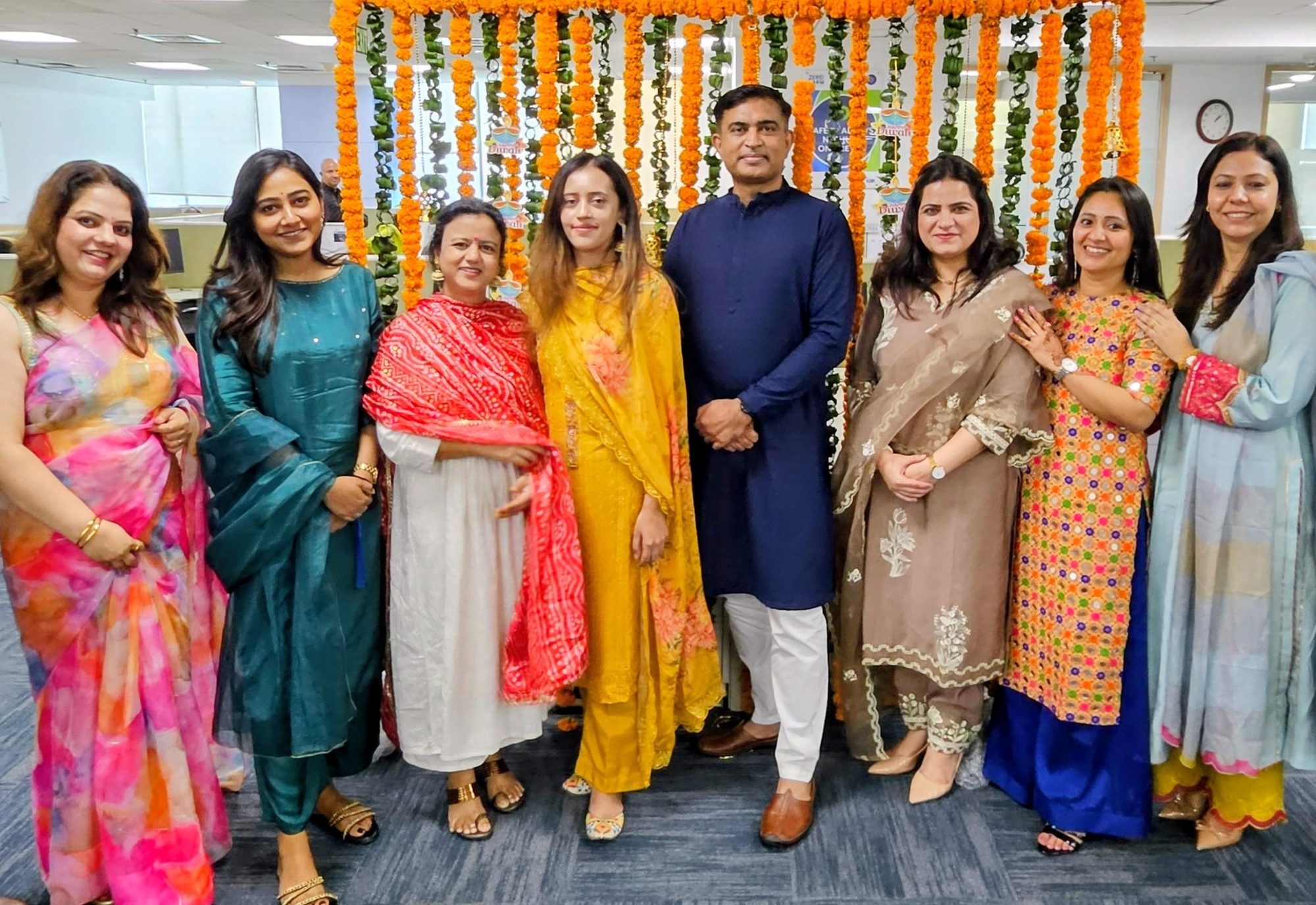 KBR India colleagues celebrating Diwali together in the office